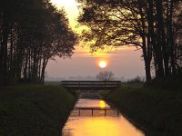 Yellow sunset  Yellow sunset over bridge and canal in a park : Netherlands, atmosphere, bomen, boom, boston, bridge, brug, bruggetje, bum rudmer, calm, canal, creatief, creative, creative nature, dageraad, dawn, ditch, dramatic, dramatisch, dutch, field, geel, gras, grass green, groen, groningen, hemel, holland, kalm, kalmte, kanaal, landelijk, landscape, landschap, nature, natuur, nederland, nederlands, onstwedde, orange, oranje, peaceful, river, rivier, rudmer zwerver, rural, rust, schemering, sereen, serene, sfeer, sky, sloot, summer, sunrise, sunset, tranquility, tree, trees, twilight, veld, vredig, walking, wandelpad, water, yellow, zomer, zonsondergang, zonsopgang